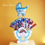 Tierno ángel con dulces